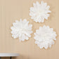 White foam craft daisy flower heads, perfect for decor and crafts.