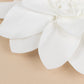 White foam daisy flower heads for crafting, soft and realistic look.