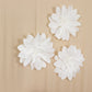 White soft foam craft daisy flower heads in a 4 pack.