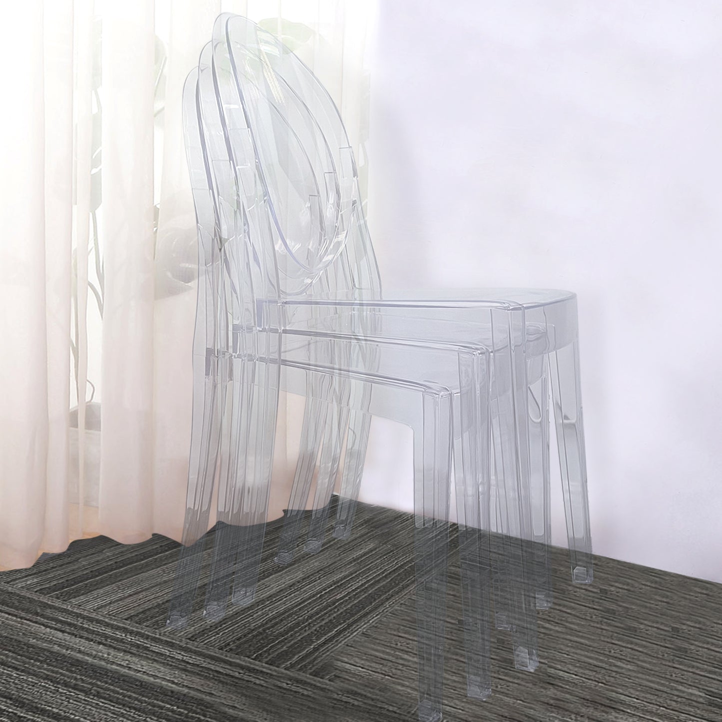 Clear acrylic ghost banquet chairs, stackable and fully assembled.