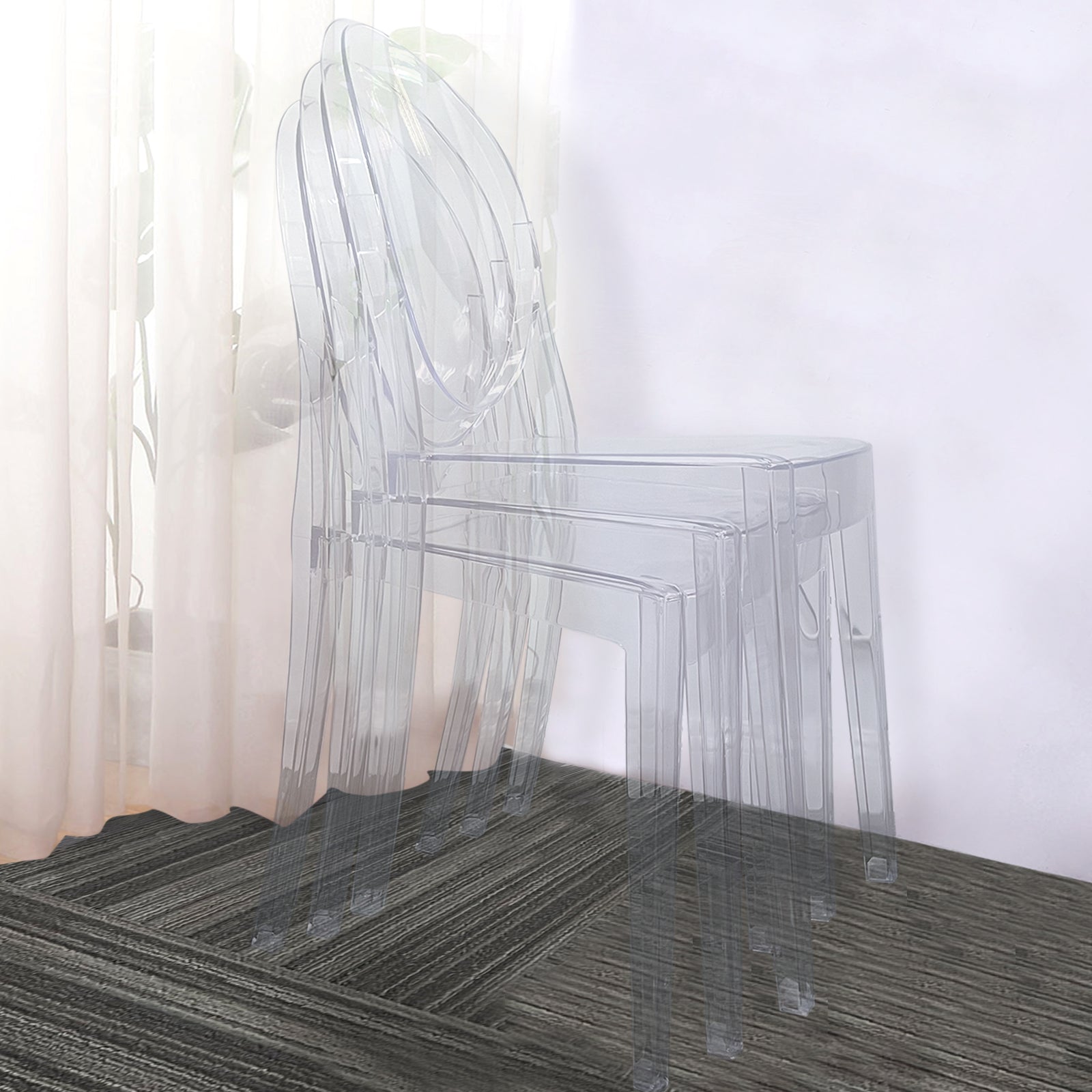 Clear acrylic ghost banquet chairs, stackable and fully assembled.