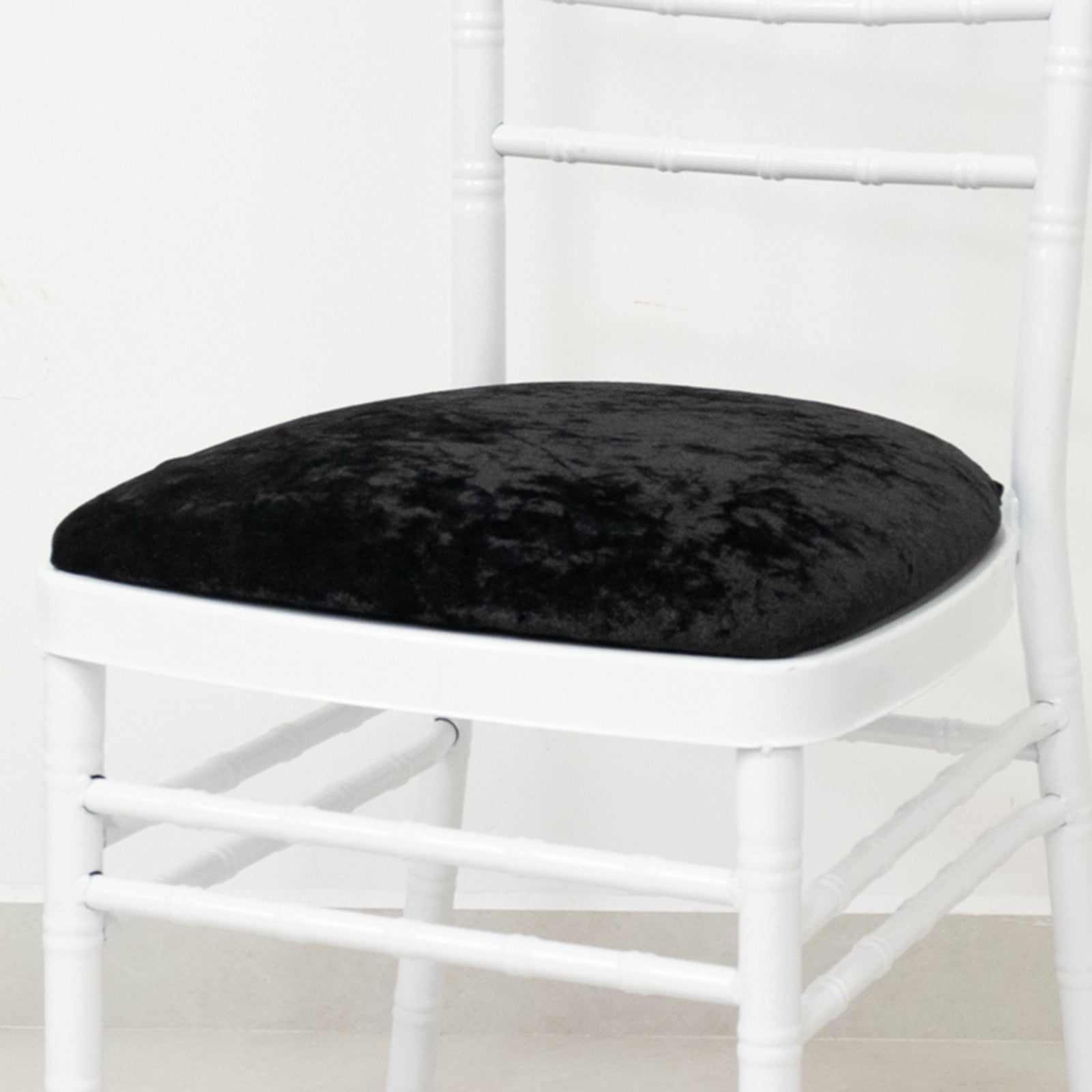 Black crushed velvet seat pad cover for Chiavari chair.