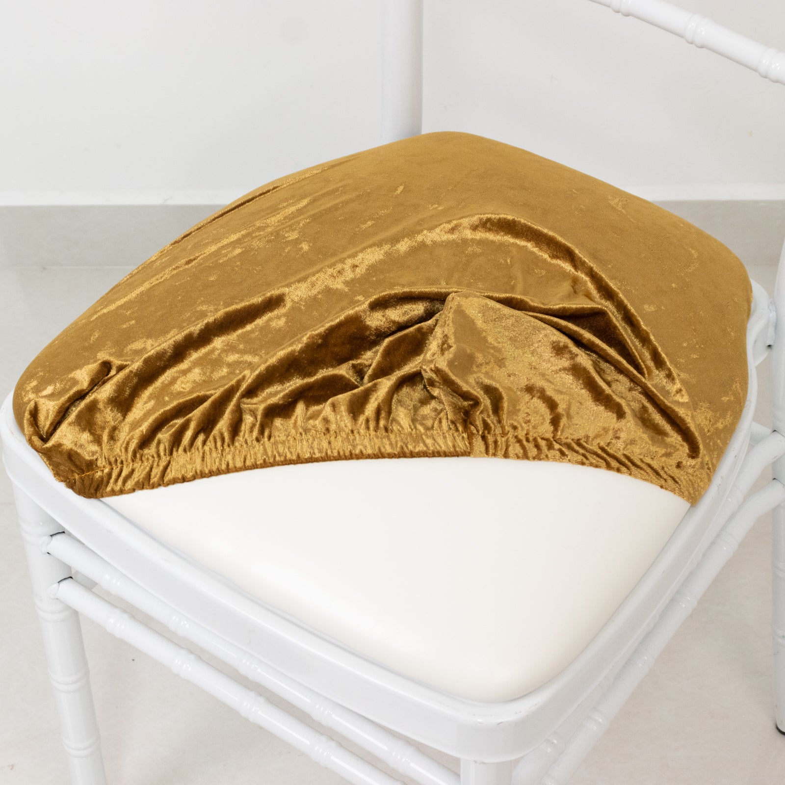 Gold crushed velvet seat pad cover for Chiavari chair.