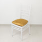 Gold crushed velvet seat pad cover on a Chiavari chair.