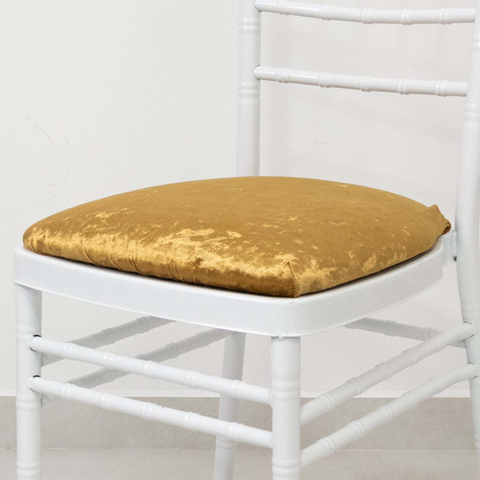 Gold crushed velvet seat pad cover for Chiavari chair.