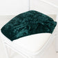 Hunter emerald green crushed velvet seat pad cover on a Chiavari chair.