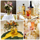 Gold rimmed champagne flute glasses with rhinestones on a festive table setting.
