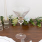 Clear martini glass with ribbed design and gold ring accent.