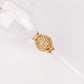Gold rimmed crystal wine goblet with rhinestone studded stem.