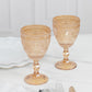 Amber vintage embossed goblets with floral design, perfect for cocktails and wine.