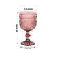 Dusty rose vintage embossed goblet wine glass with floral pattern.
