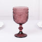 Dusty rose vintage embossed goblet wine glass with floral pattern.