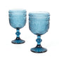 Ocean blue vintage embossed goblet wine glasses, short stemmed, textured floral pattern.