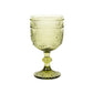 Dusty sage green vintage embossed goblet wine glass with floral pattern.