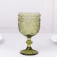 Dusty sage green vintage embossed goblet wine glass with floral pattern.