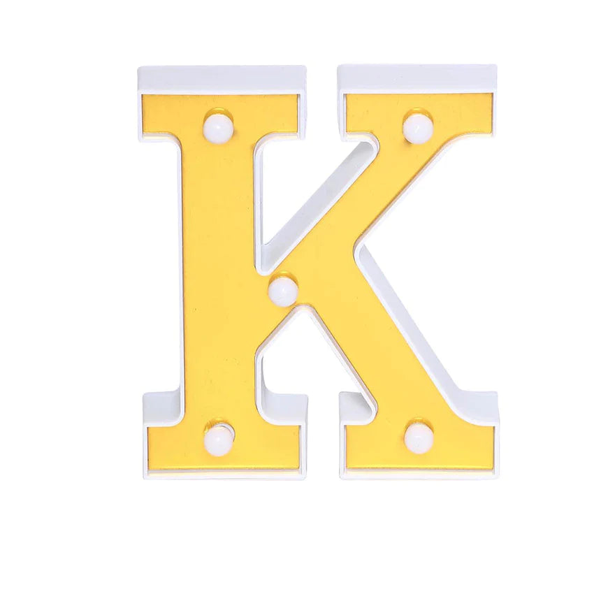 Gold 3D marquee letter "K" with warm white LED lights.