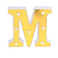 Gold 3D marquee letter "M" with warm white LED lights.