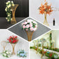 Gold metal wire trumpet-shaped flower centerpiece stand.