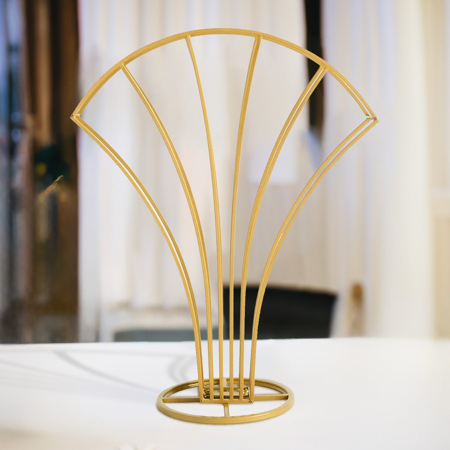 Gold metal scalloped fan shape flower frame centerpiece.