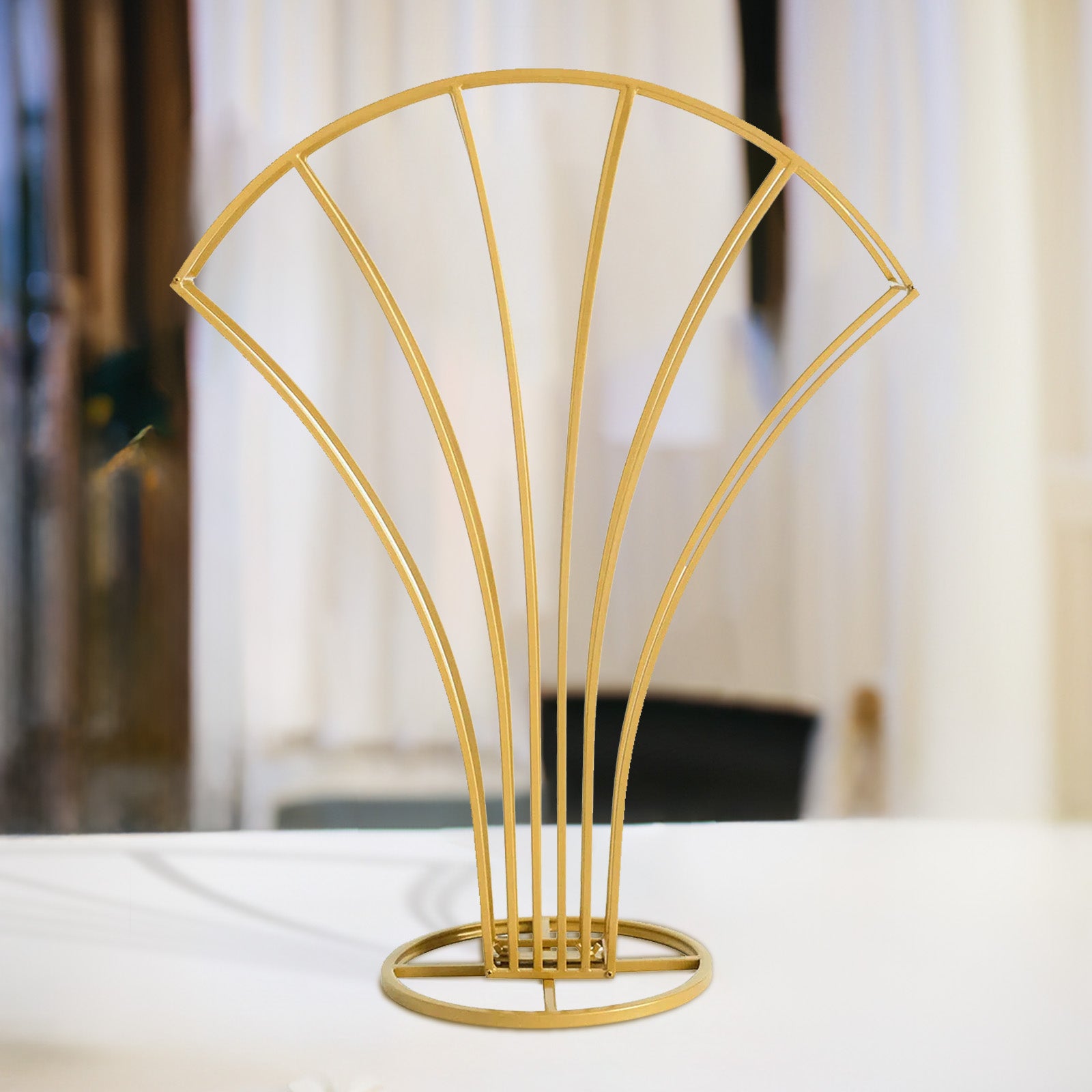 Gold metal scalloped fan shape flower frame centerpiece.