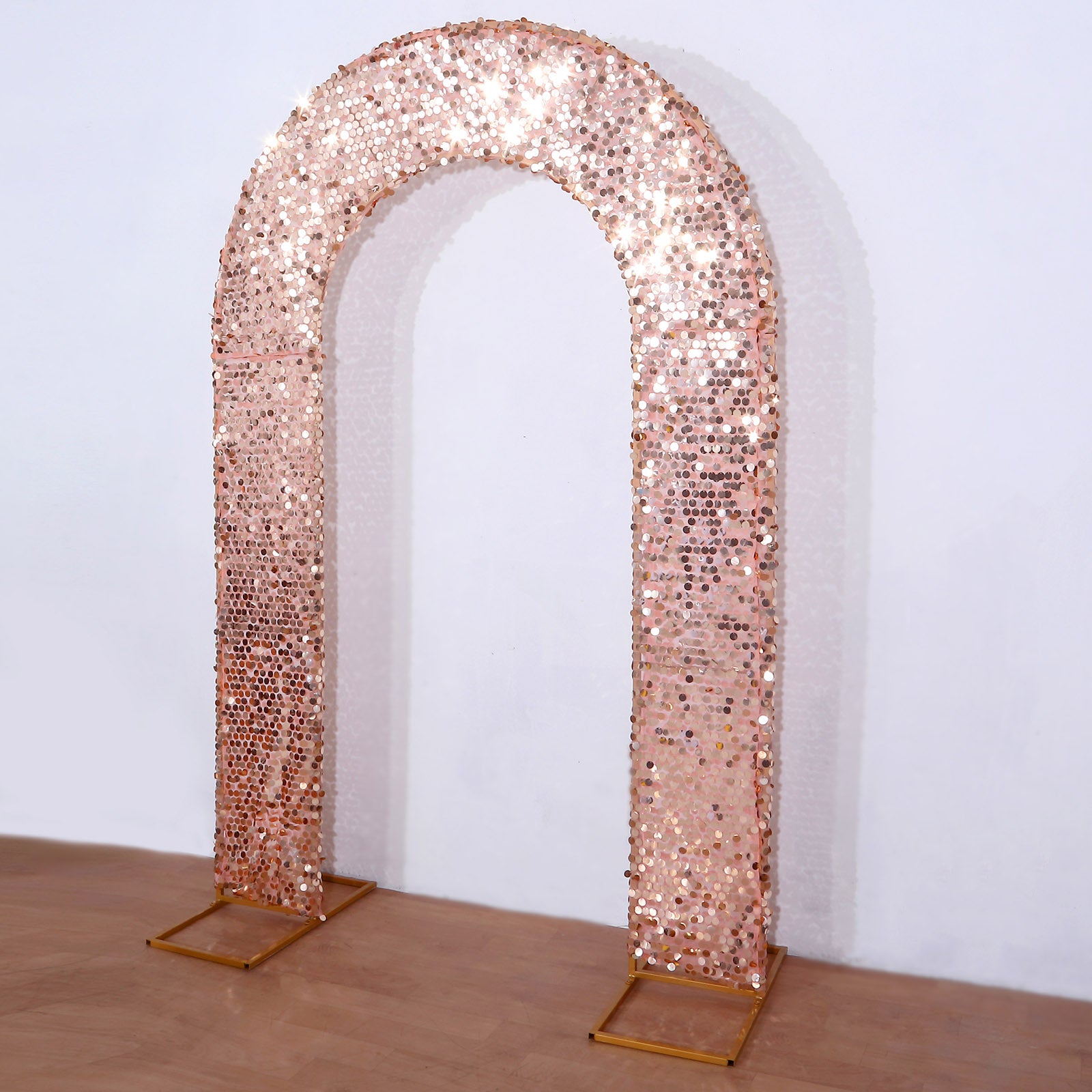 Rose gold sequin wedding arch cover backdrop.
