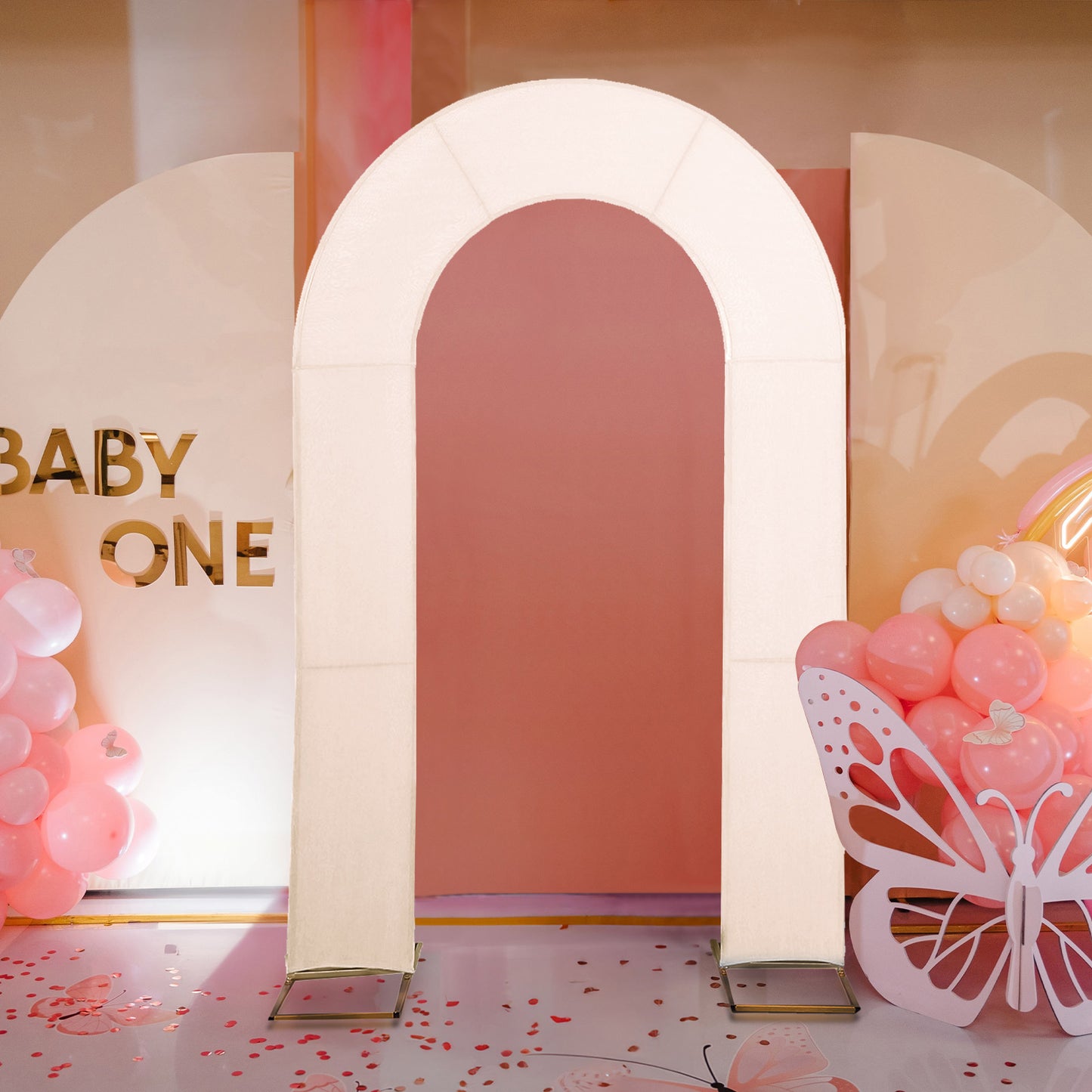 Blush spandex fitted wedding arch cover backdrop for events.