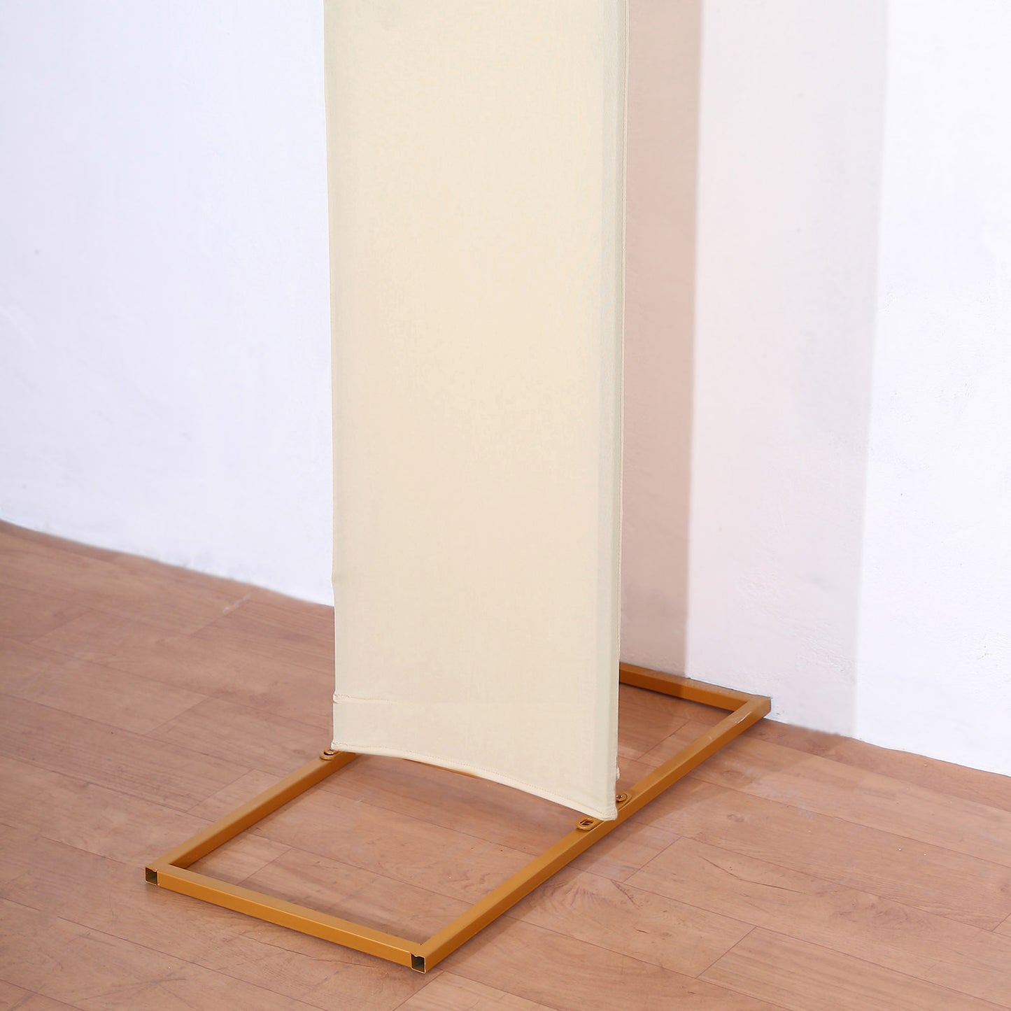 Beige spandex fitted cover for wedding arch backdrop.