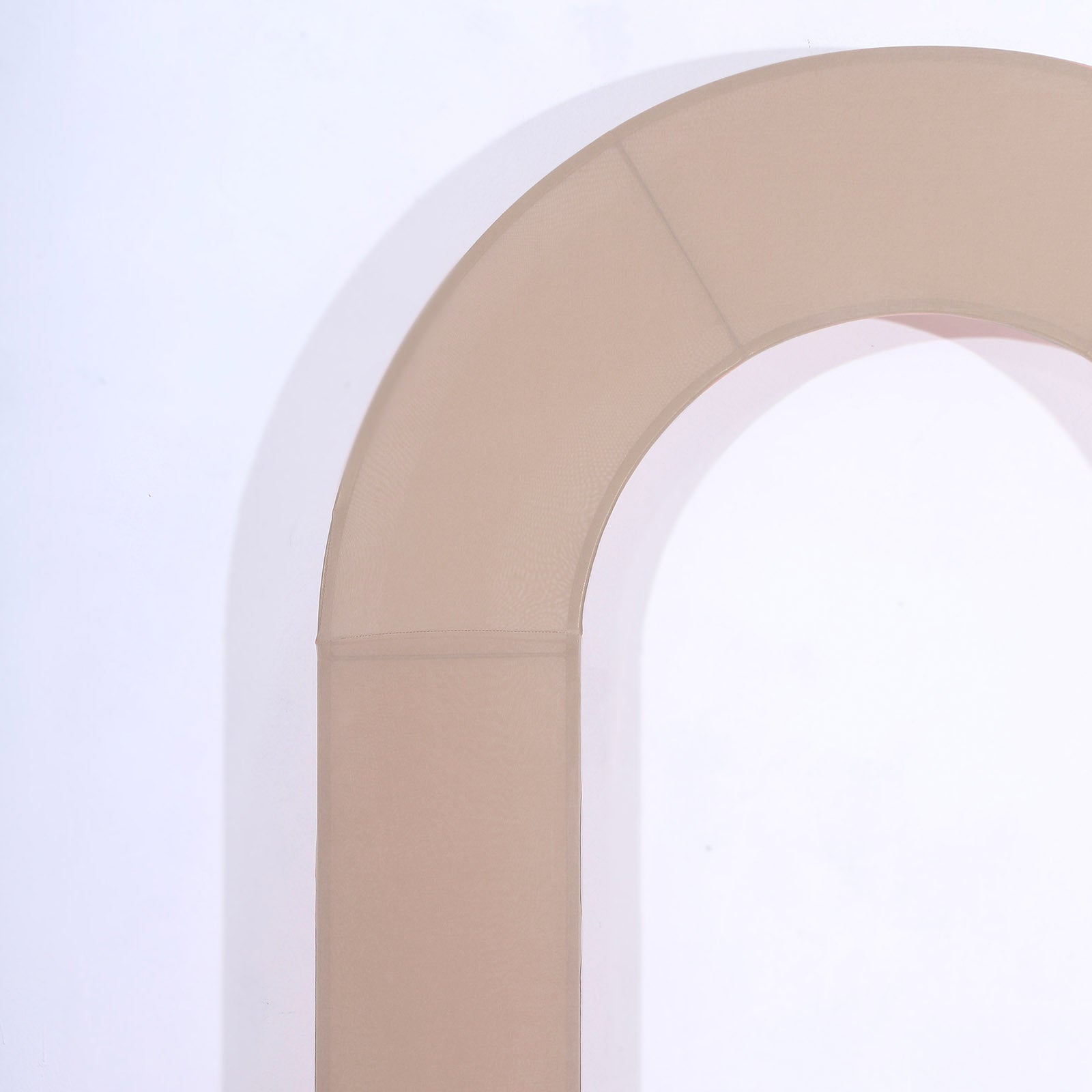 Nude spandex fitted wedding arch cover with open arch design.