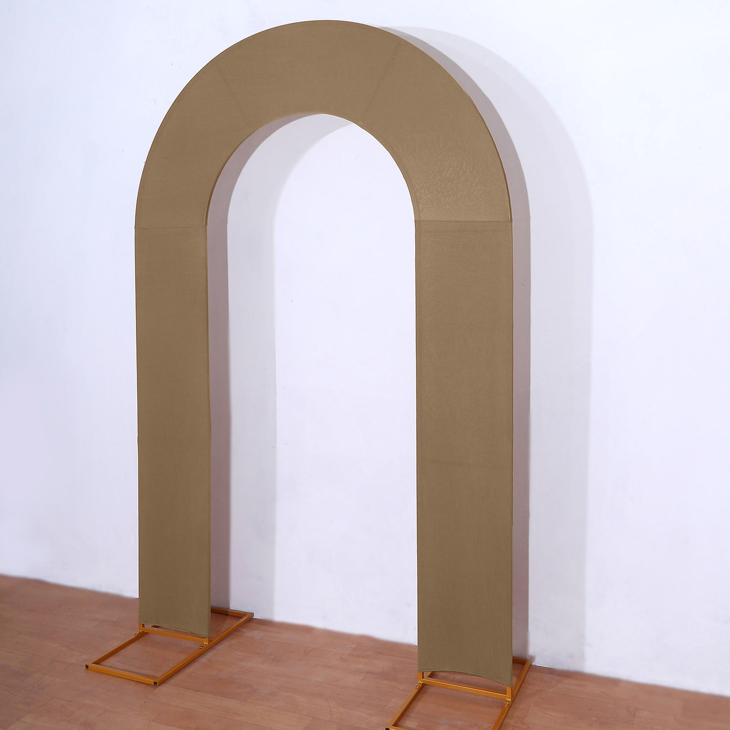 Taupe spandex wedding arch cover for events and ceremonies.