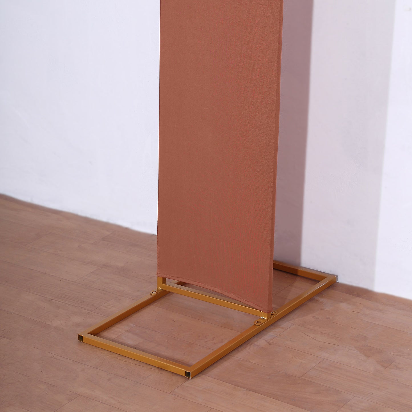 Terracotta spandex fitted cover for wedding arch backdrop.