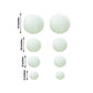 Set of 8 ivory hanging paper lanterns in assorted sizes.