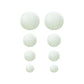 Set of 8 ivory hanging paper lanterns in assorted sizes.