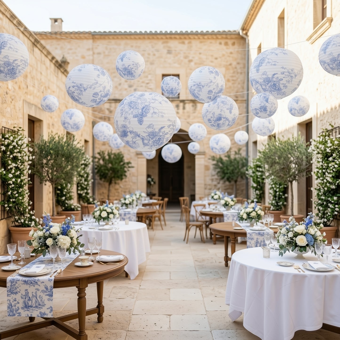 Set of 8 white and blue floral hanging paper lanterns for decorative events.