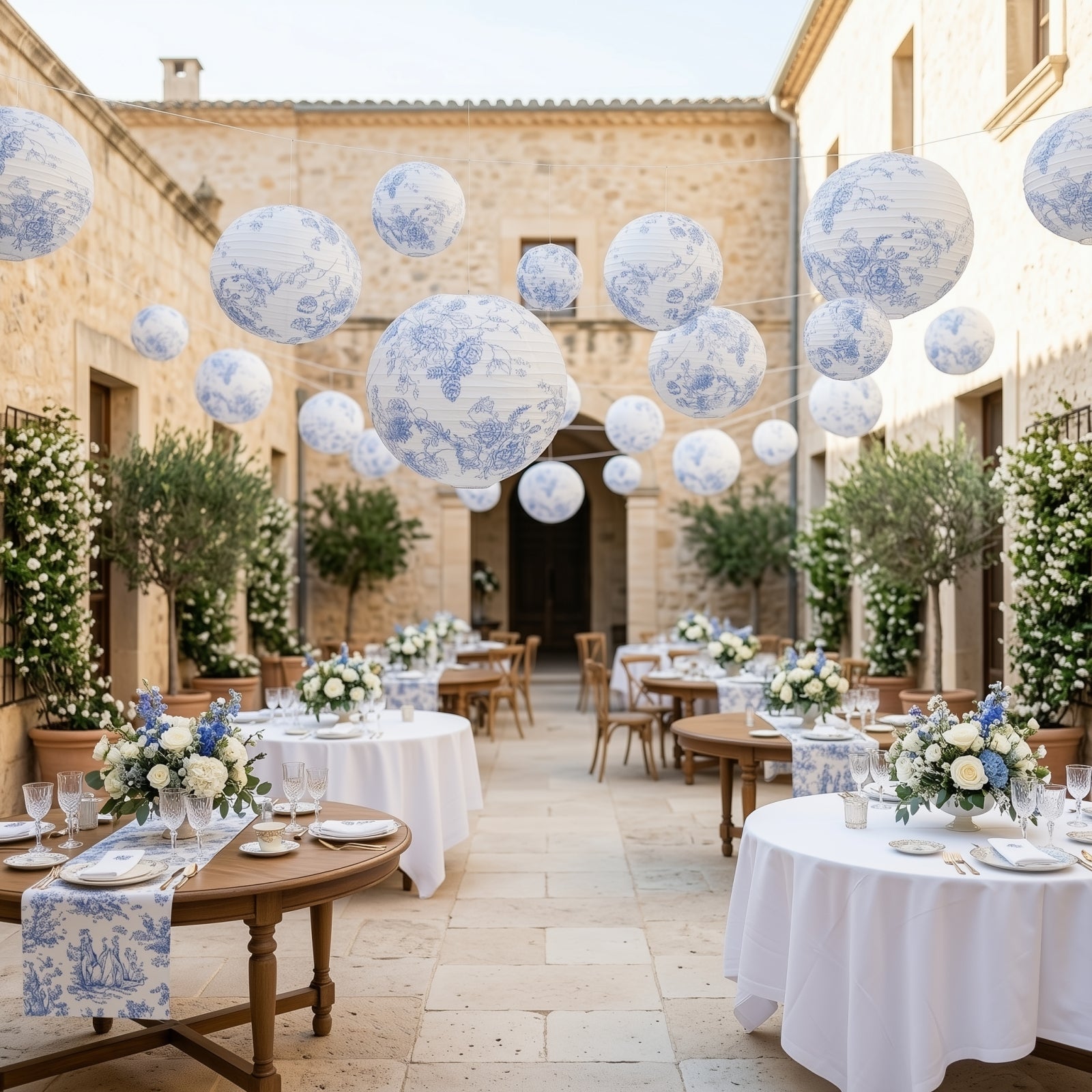 Set of 8 white and blue floral hanging paper lanterns for decorative events.