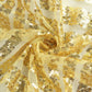 Gold sequin table overlay topper with diamond glitz design.