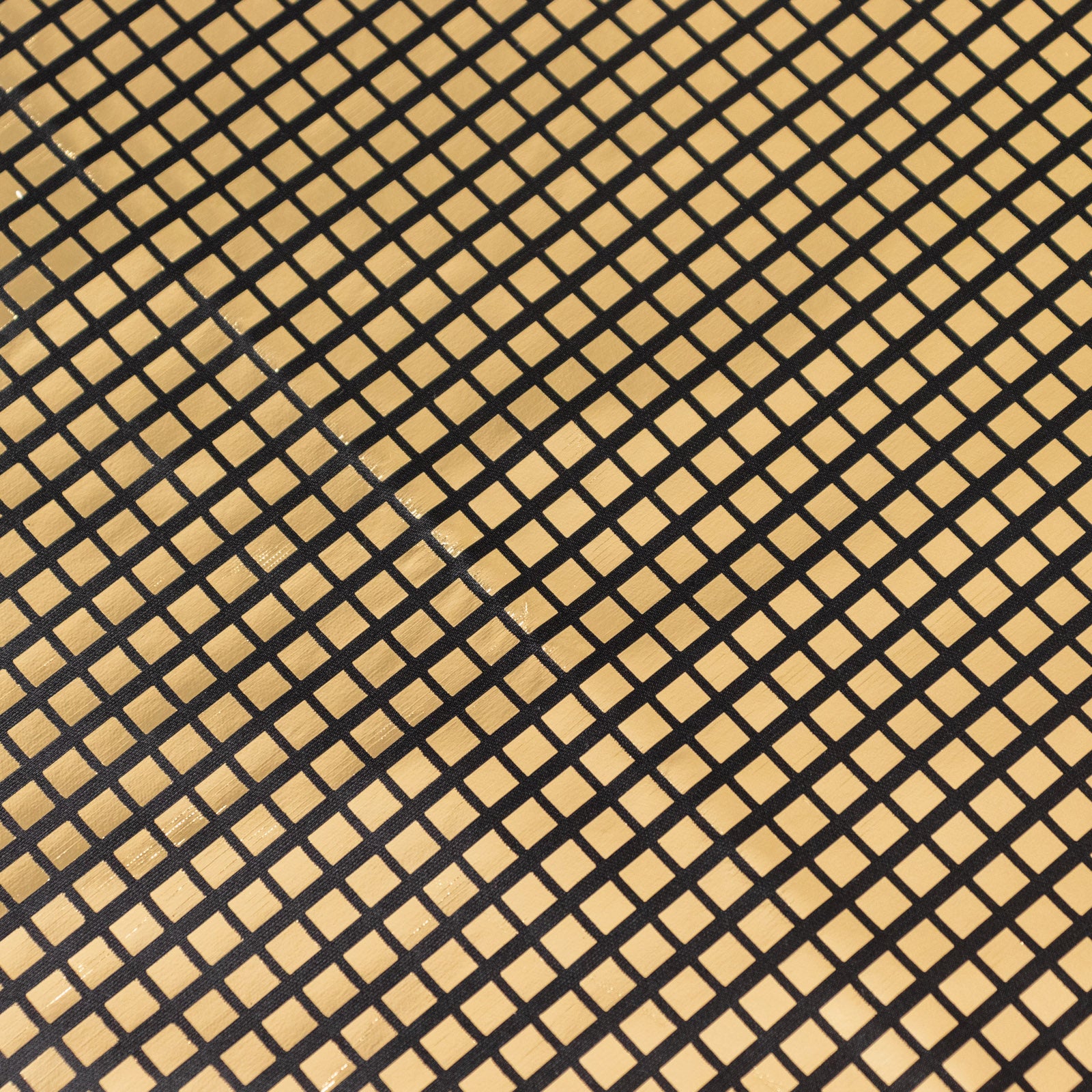 Shiny black and gold foil polyester table overlay, disco mirror ball theme.