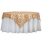 Matte champagne big payette sequin table overlay on a white tablecloth.