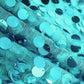 Turquoise sequin table overlay with big payette design. #whtbkgd