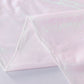 Iridescent glitter sparkle polyester table overlay in soft pink.