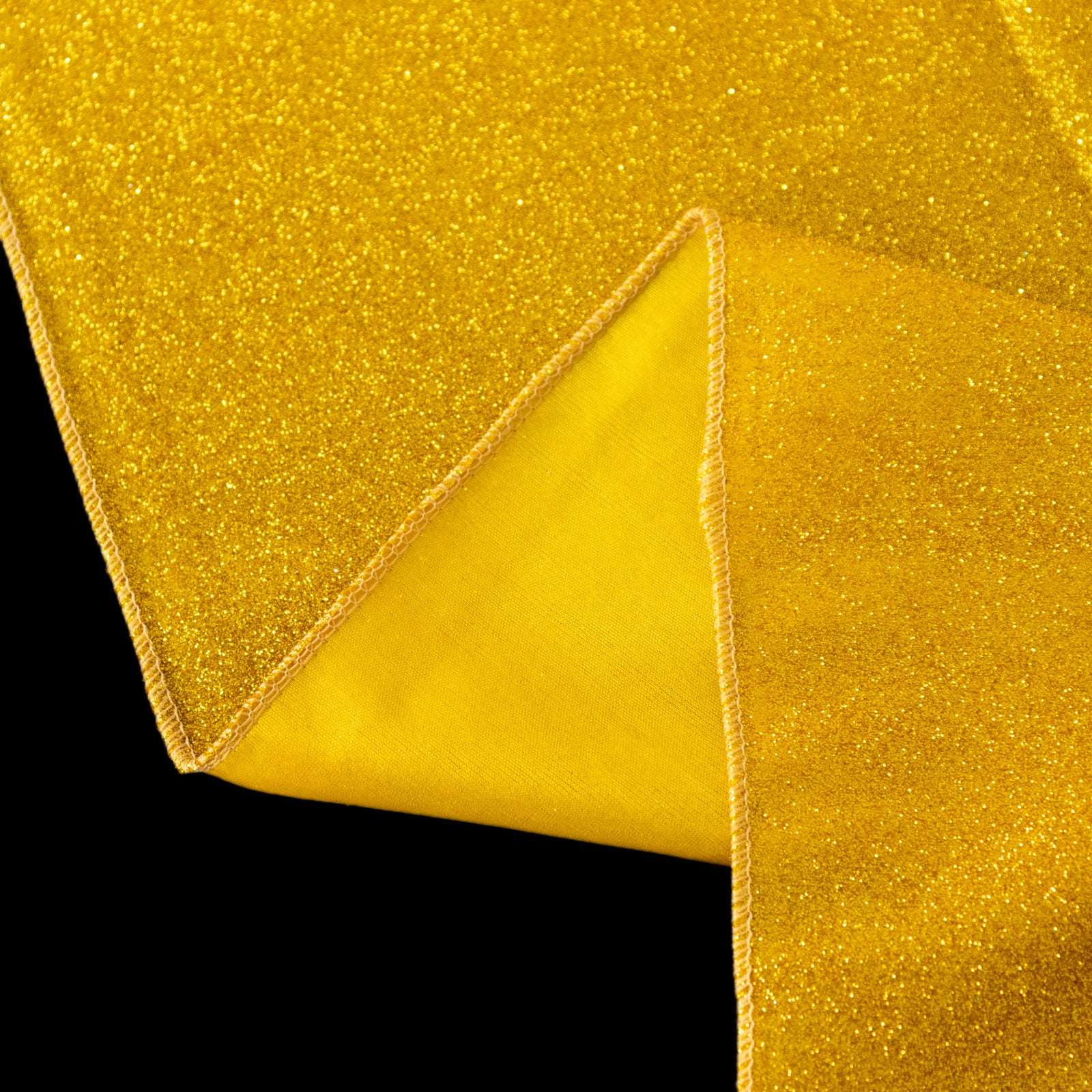 Gold glitter table overlay with shimmery sparkle effect.