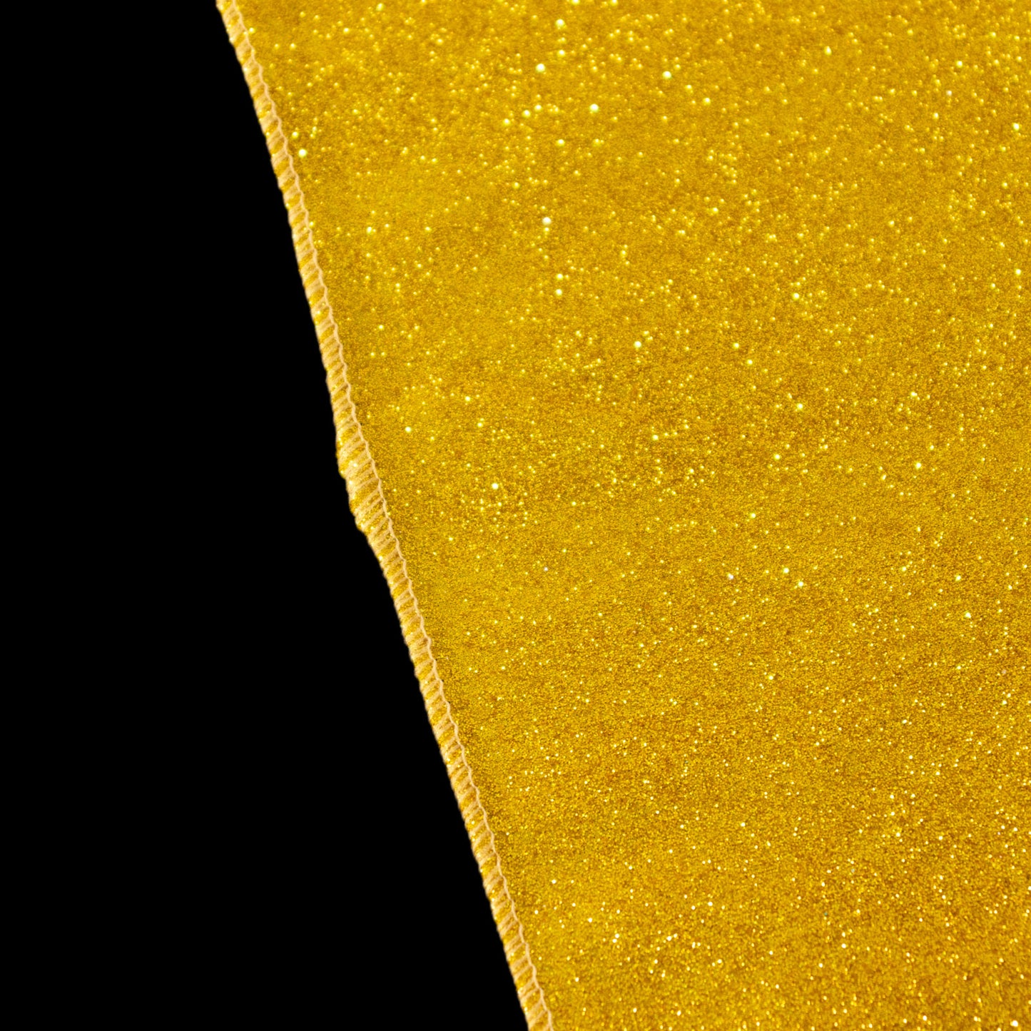 Gold glitter table overlay with a shimmery finish.