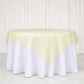 Champagne sheer organza table overlay on a white tablecloth.