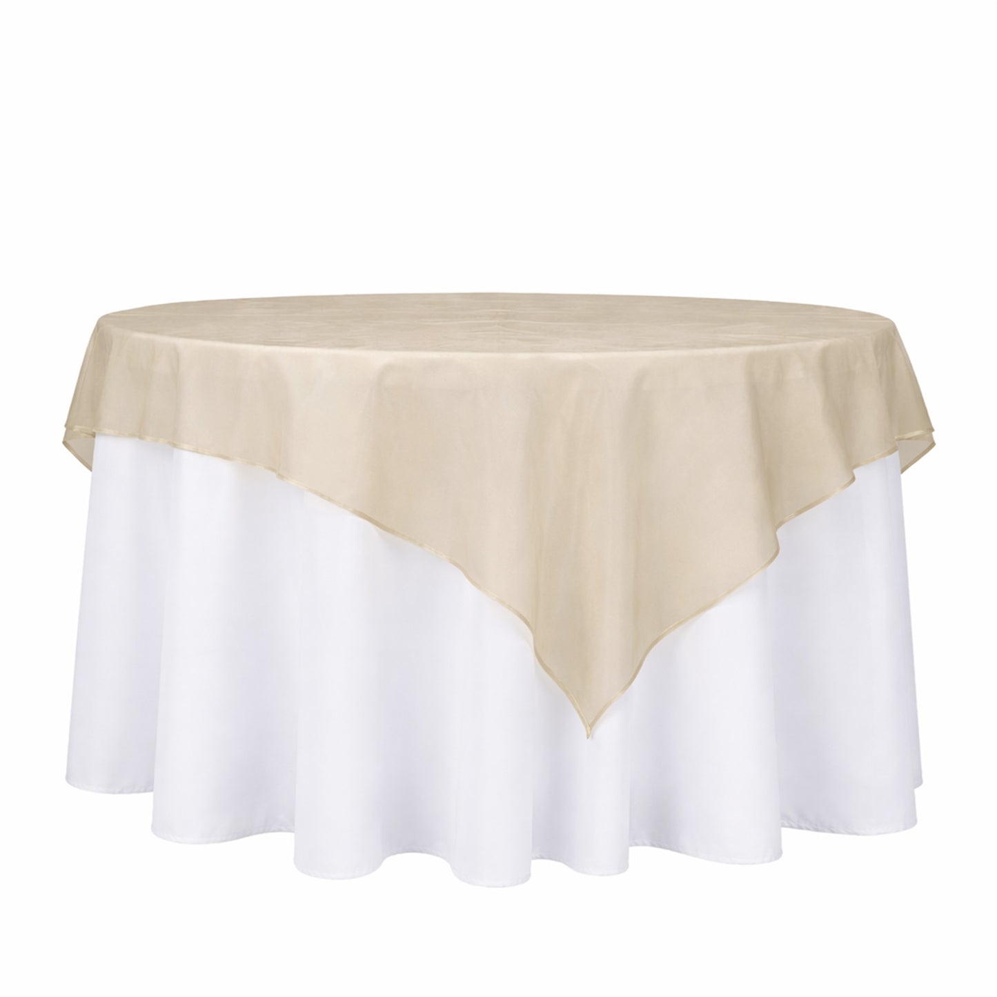 Gold organza table overlay 72"x72" on a round table with a white tablecloth.