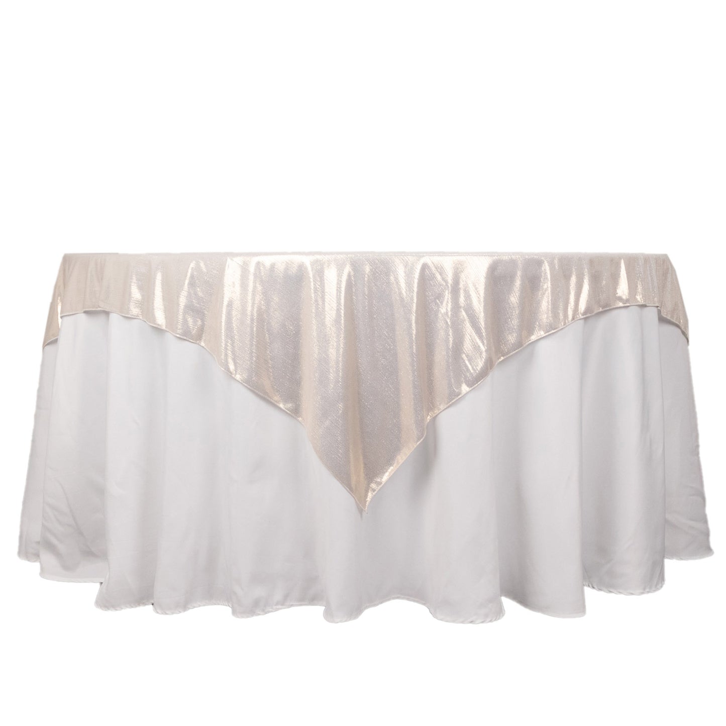 Beige shimmer sequin dots table overlay on a white tablecloth.