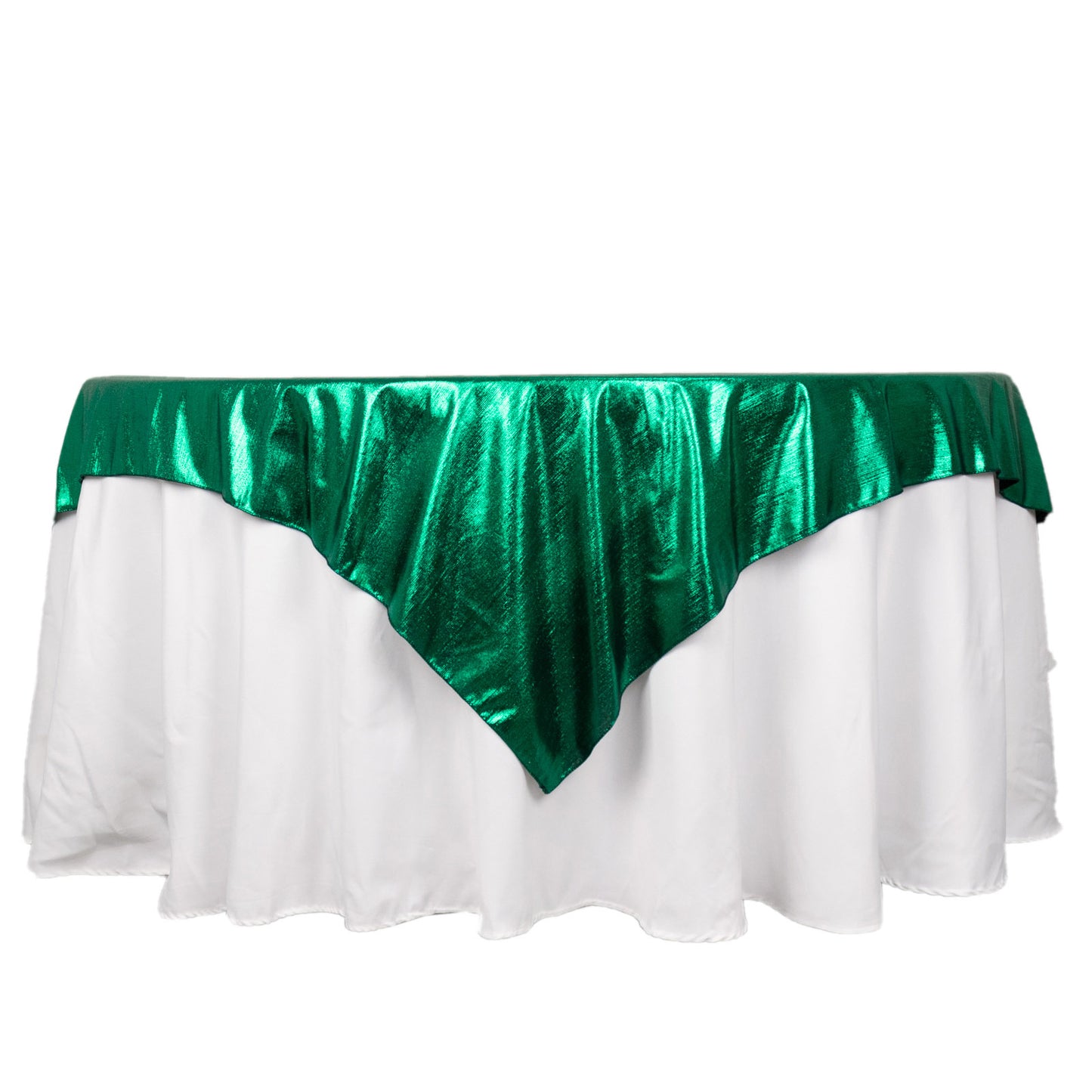 Emerald green shimmer sequin table overlay on a white tablecloth.