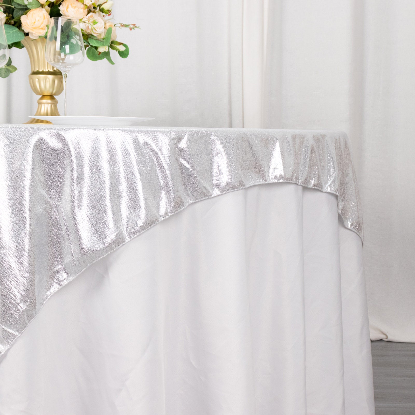 Silver shimmer sequin dots table overlay, wrinkle-free glitter topper.