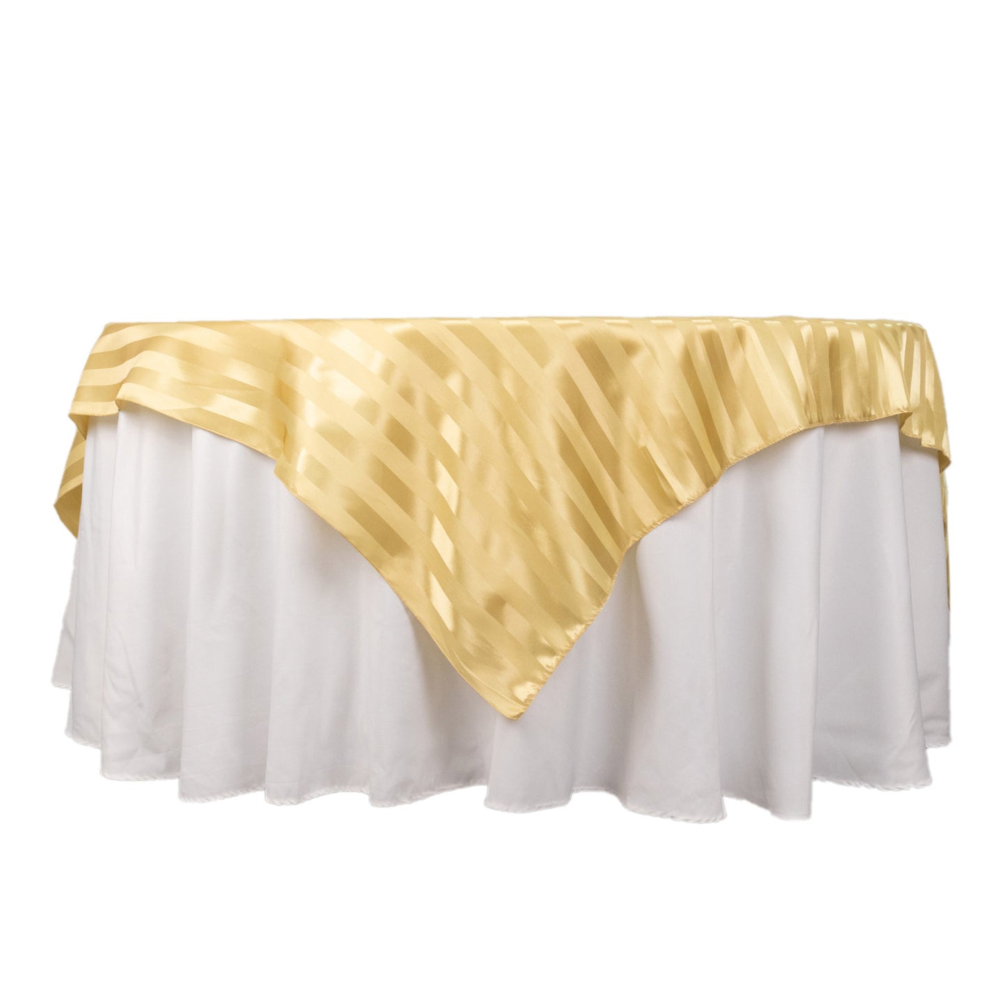 Champagne satin stripe table overlay for elegant table decor.