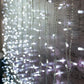 Cool white 600 LED curtain string lights with 8 modes.