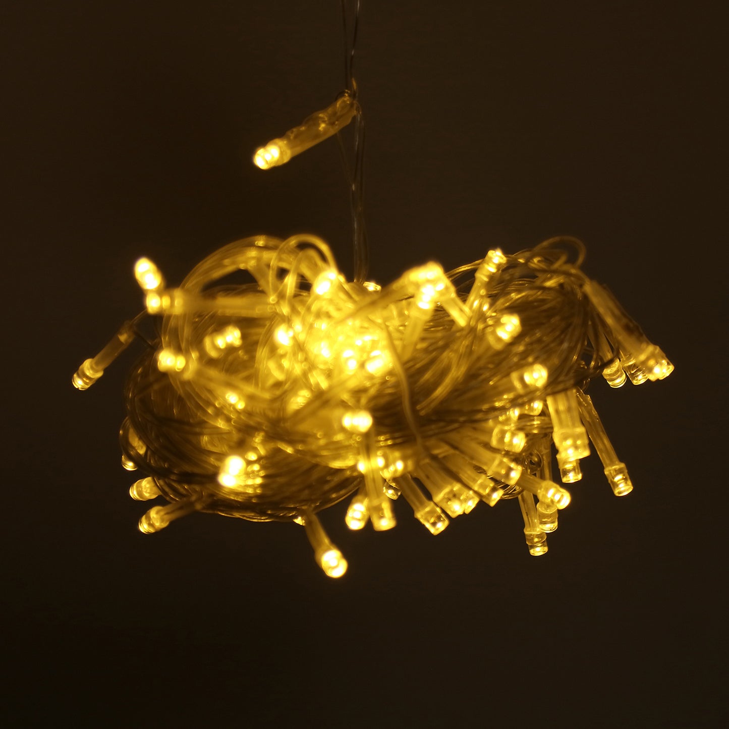 Warm white 900 LED curtain string lights for indoor and outdoor use.