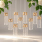 Gold oval frame hanging crystal lights with teardrop pendants.